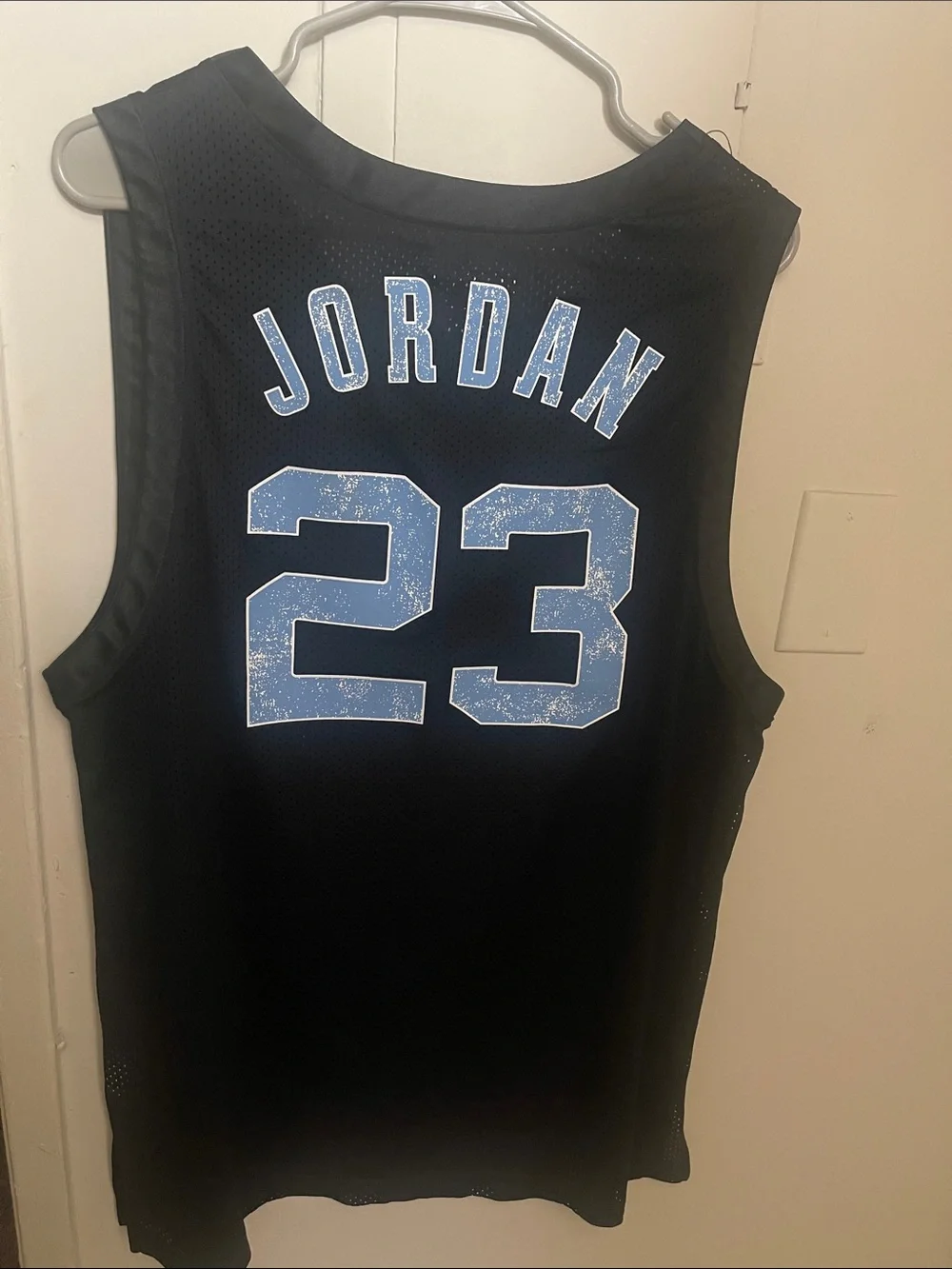 Jordan Black Mesh Basketball Jersey with Red Accents